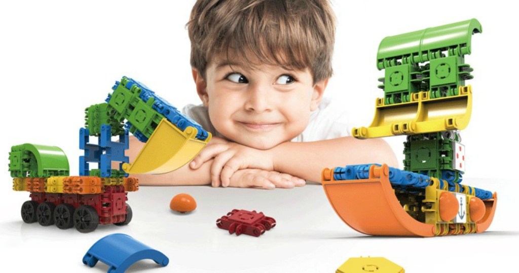 kid playing with Magformers Clicformers