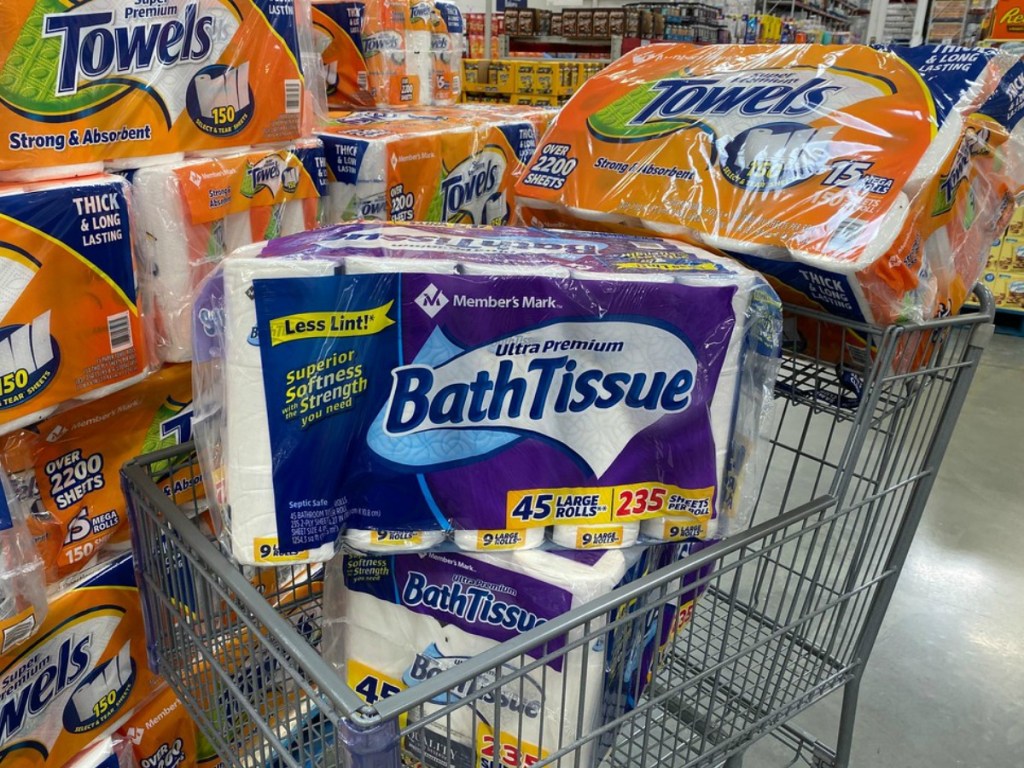 Member's Mark bathroom tissue and paper towels in a cart at Sam's Club