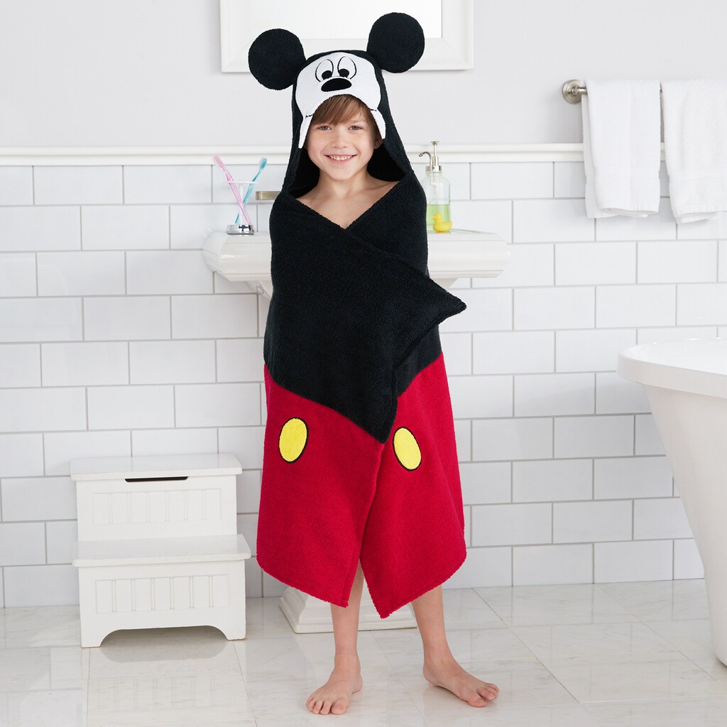 kid wearing Mickey Mouse hooded towel