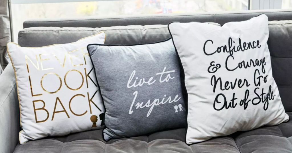 couch with boy meets girl pillows