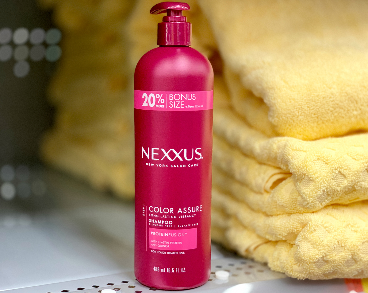 Nexxus Color Assure Shampoo by yellow towel