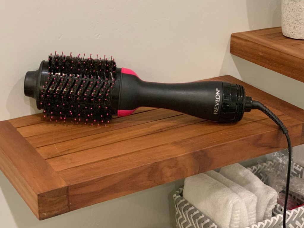 Revlon Hair Dryer And Volumizer on wooden shelf