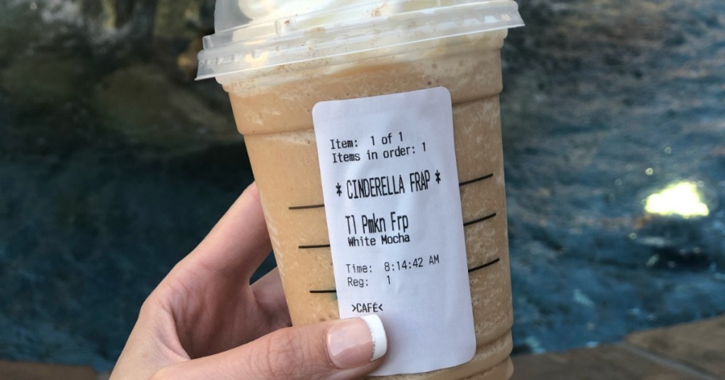woman holding Starbucks Cinderella Drink