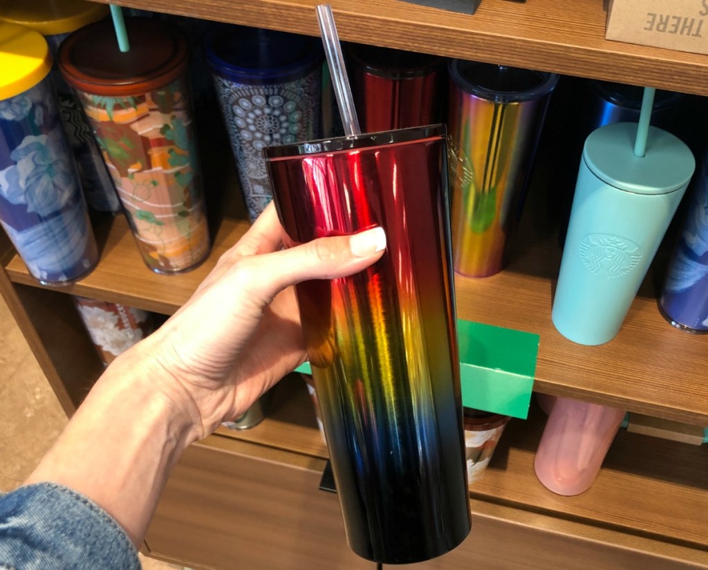 Target Starbucks Cafe rainbow tumbler in hand in-store