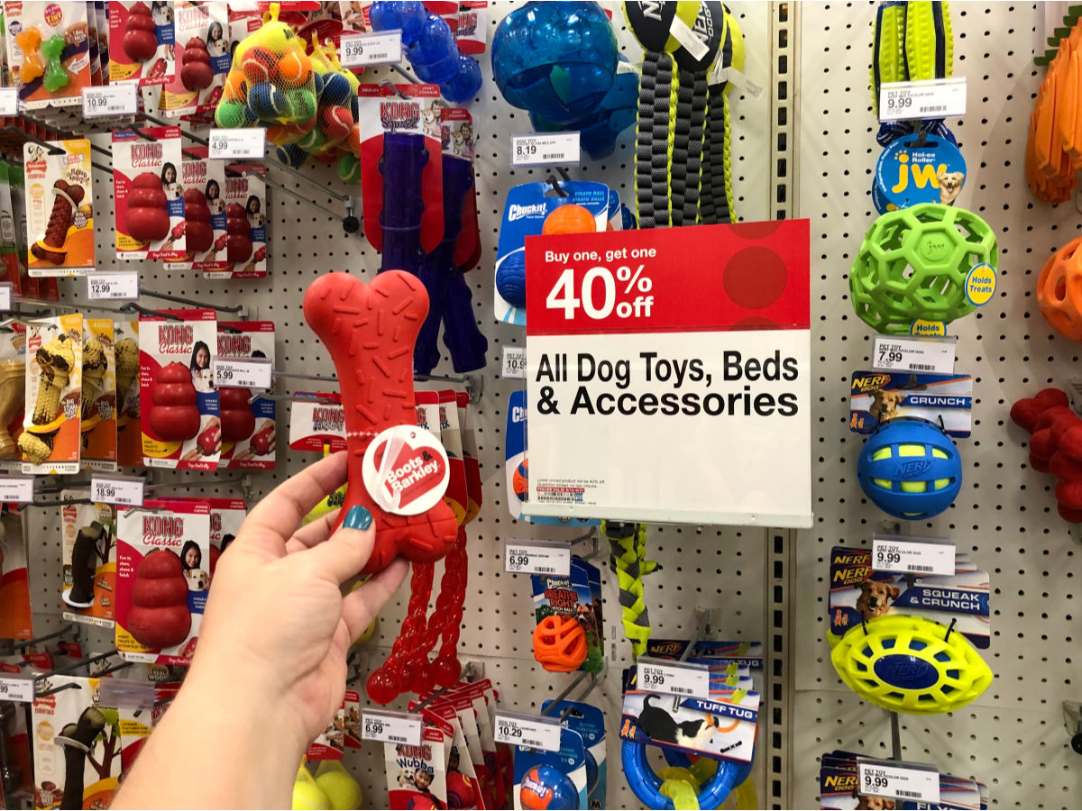 Target Dog Toys, Beds, & Accessories sign with dog toy in store