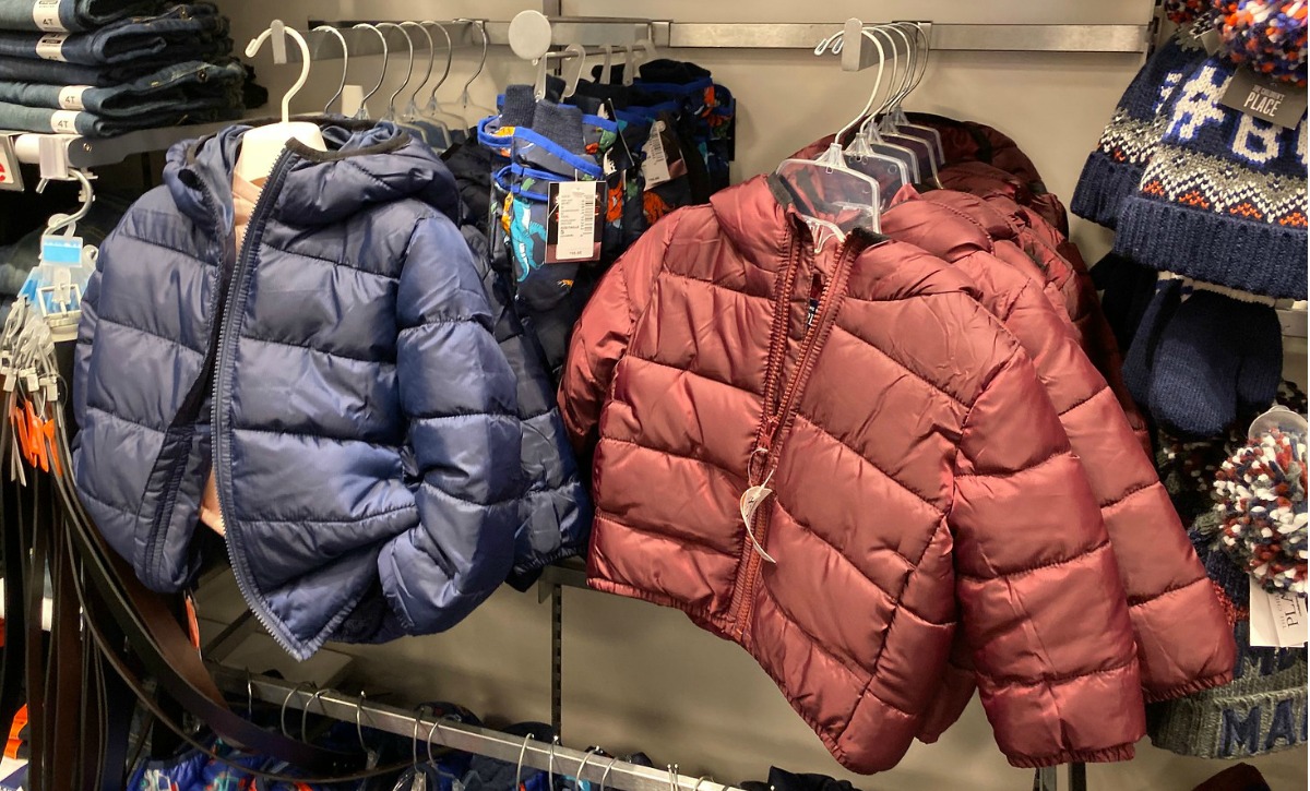 Toddler Puffer jackets in two colors on rack in store
