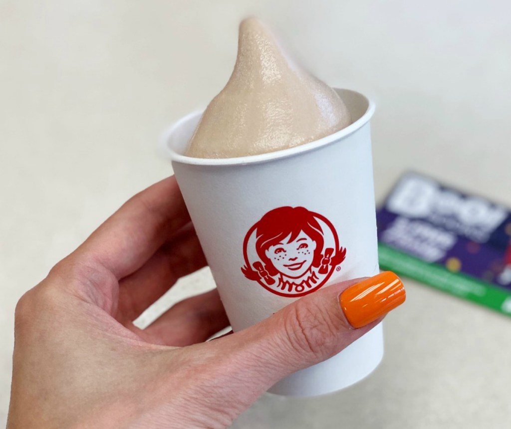 Wendy's Junior Frosty in-hand in Wendy's restaurant