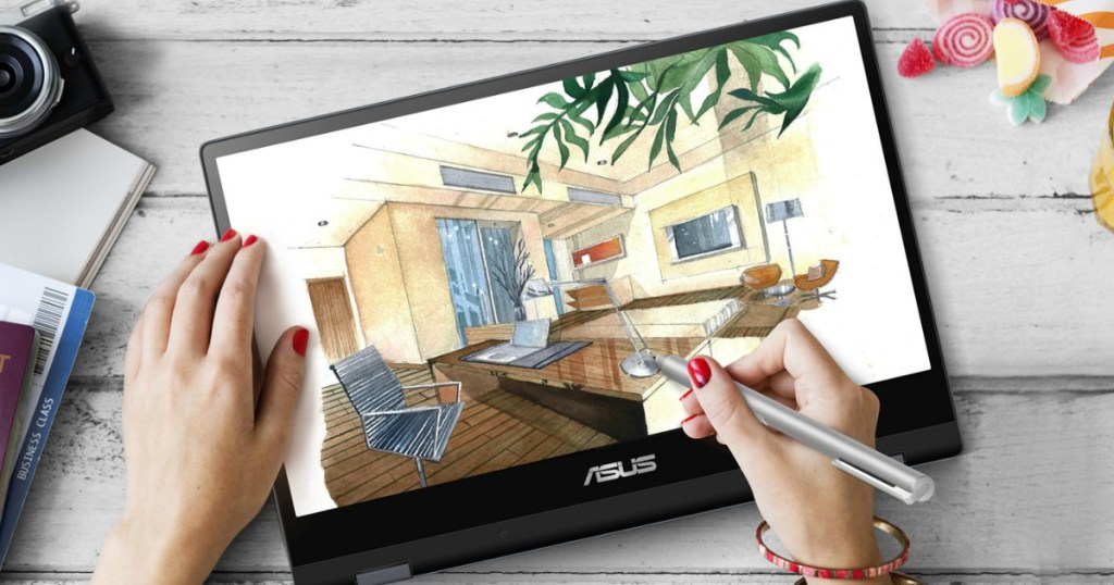 womans hands using the pen on asus touch screen