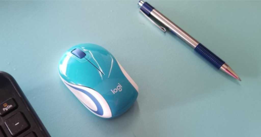 logi mouse by pen for comparison