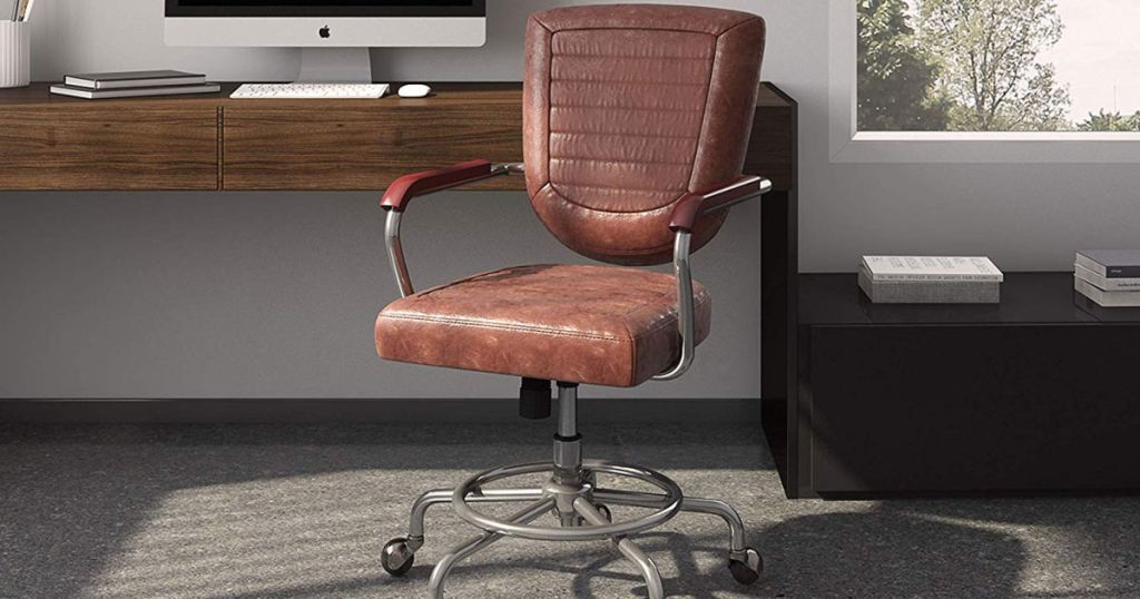 brown leather office chair in office