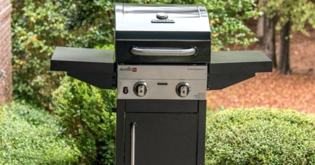 char-broil grill outdoors with shrubbery and yard behind grill
