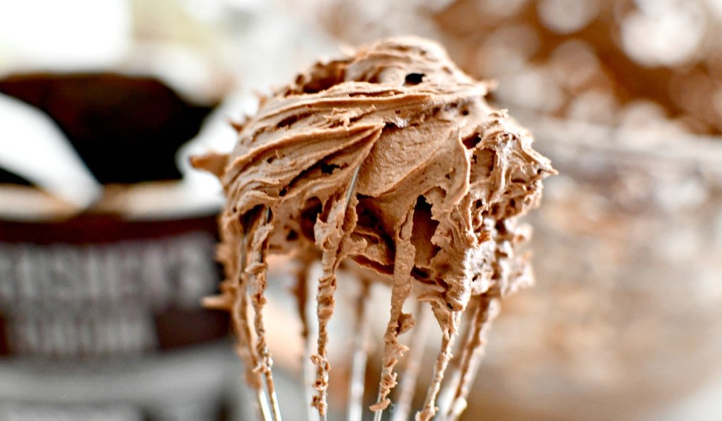 chocolate buttercream frosting on a whisk