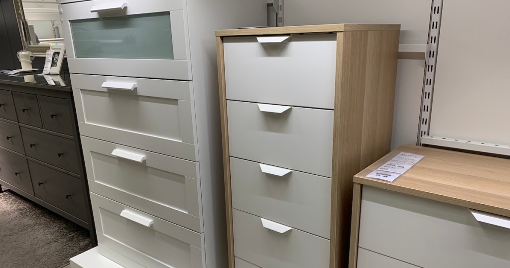 white and natural wood dressers in IKEA store