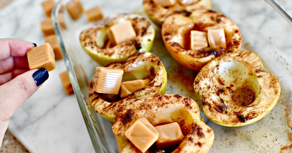 stuffing roasted apples with caramel candy