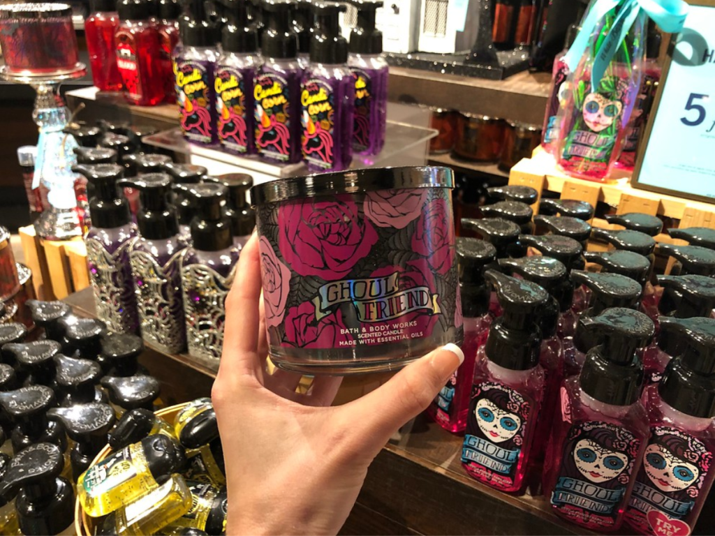 hand holding ghoul friend candle