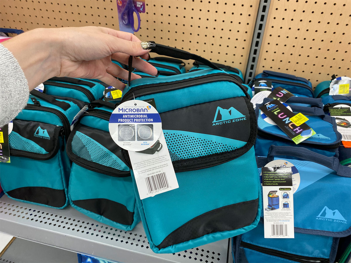 hand holding blue arctic zone lunch bag on clearance at walmart