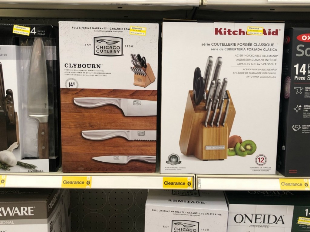 store shelf with knife sets on it