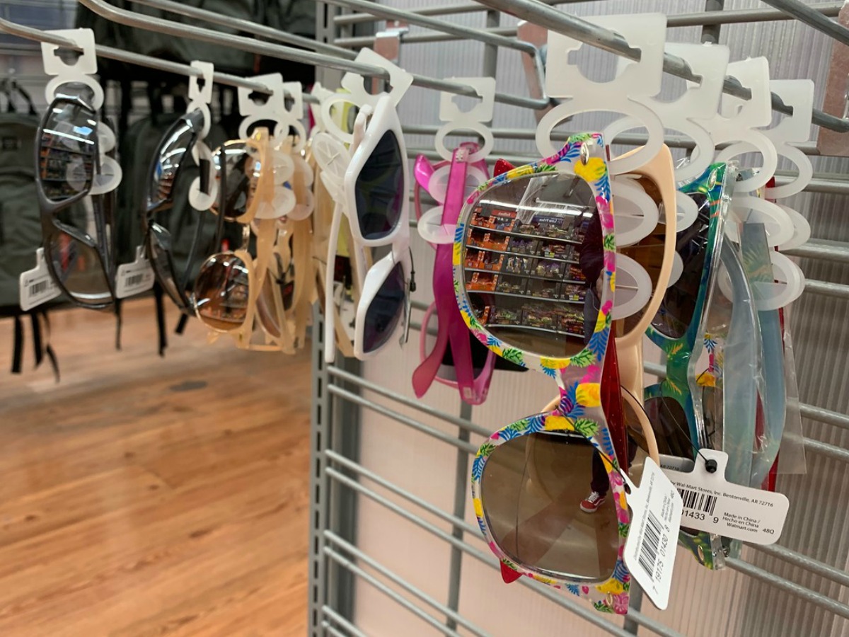sunglasses hanging on store display