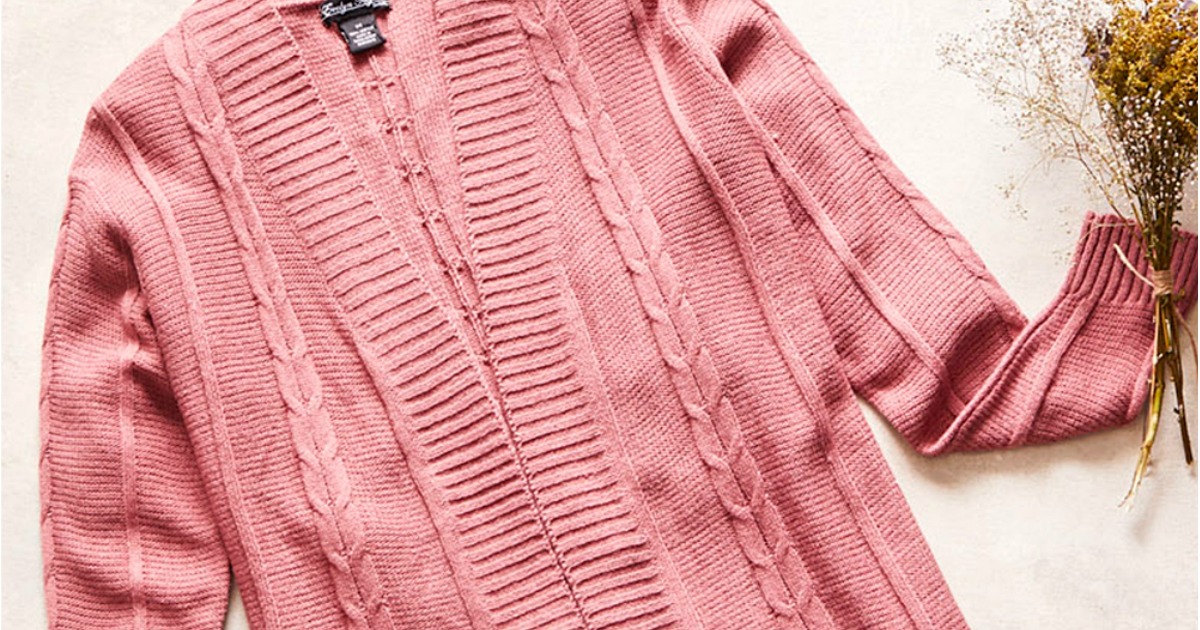 pink cardigan sweater flat-lay