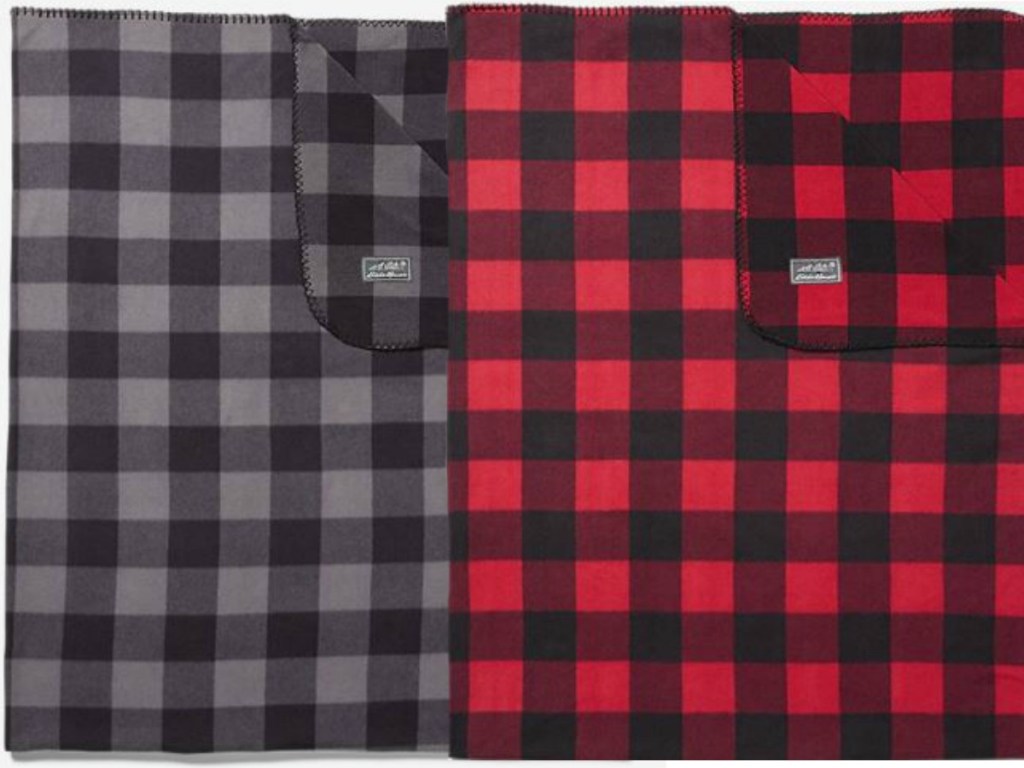 2 blankets, one is black and the other is red plaid