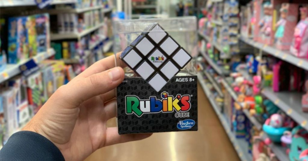 hand holding up rubiks cube game