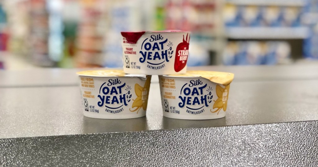 silk oat yeah yogurts with blurred background