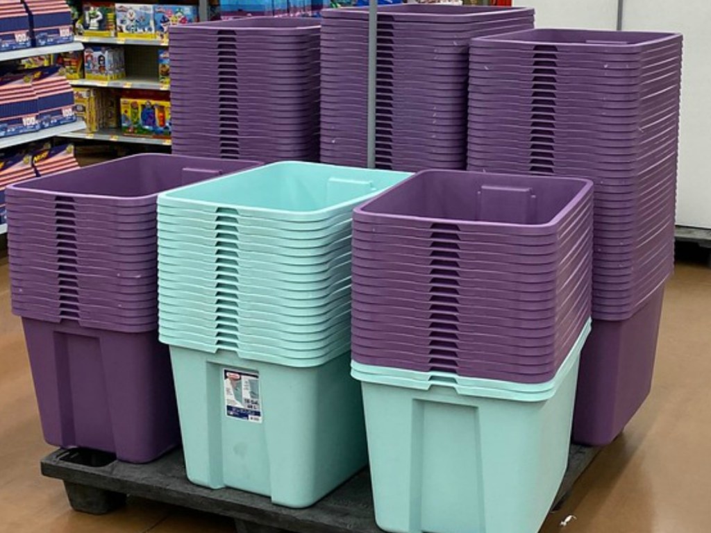 stacks of colored plastic totes in store