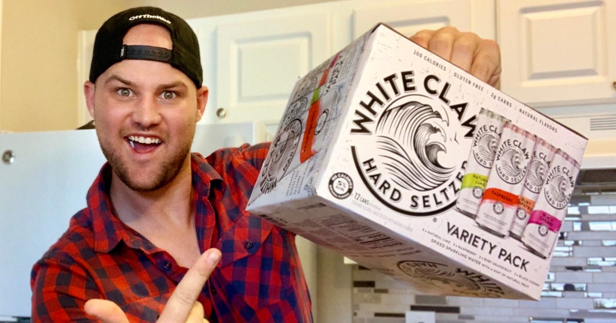 man with case of White Claw