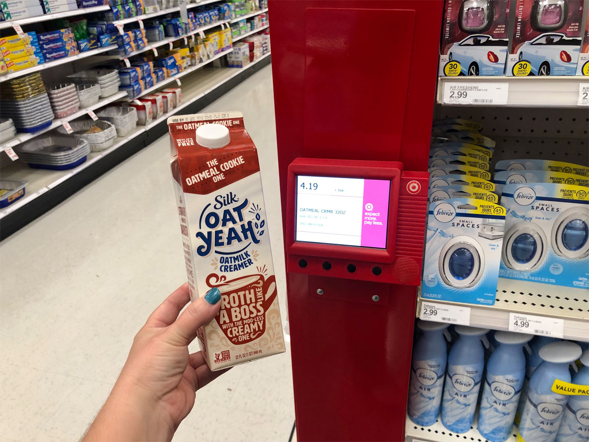 hand holding silk oat yeah coffee creamer oatmeal cookie at target