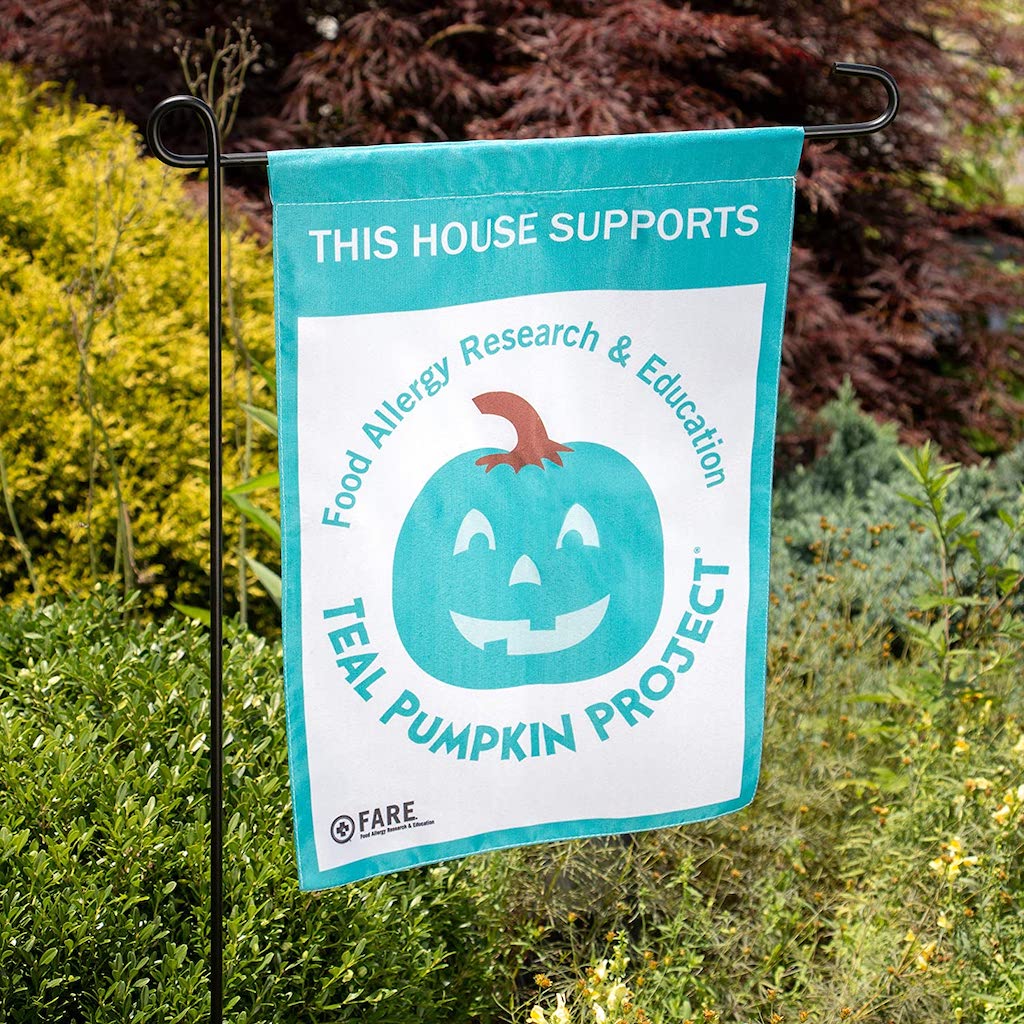 teal pumpkin project sign in yard 