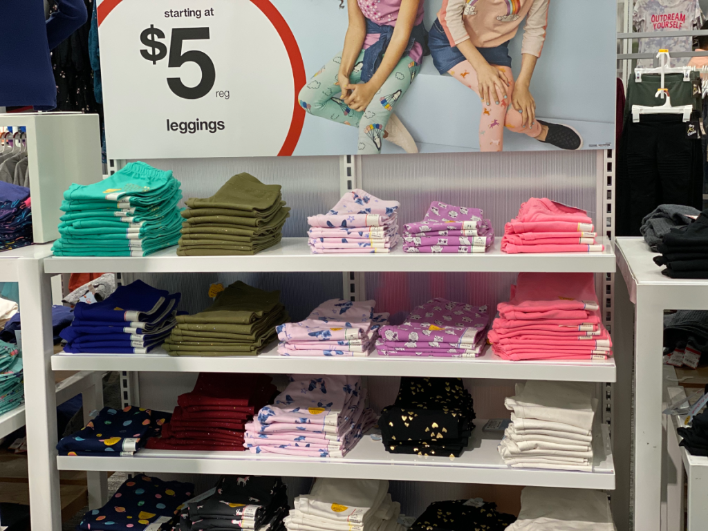 toddler girls leggings on store shelf with $5 sign 