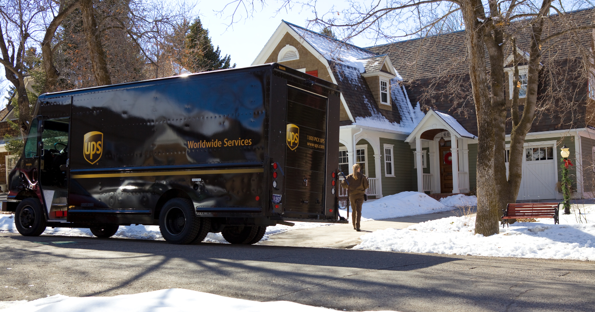 UPS truck delivering in snow
