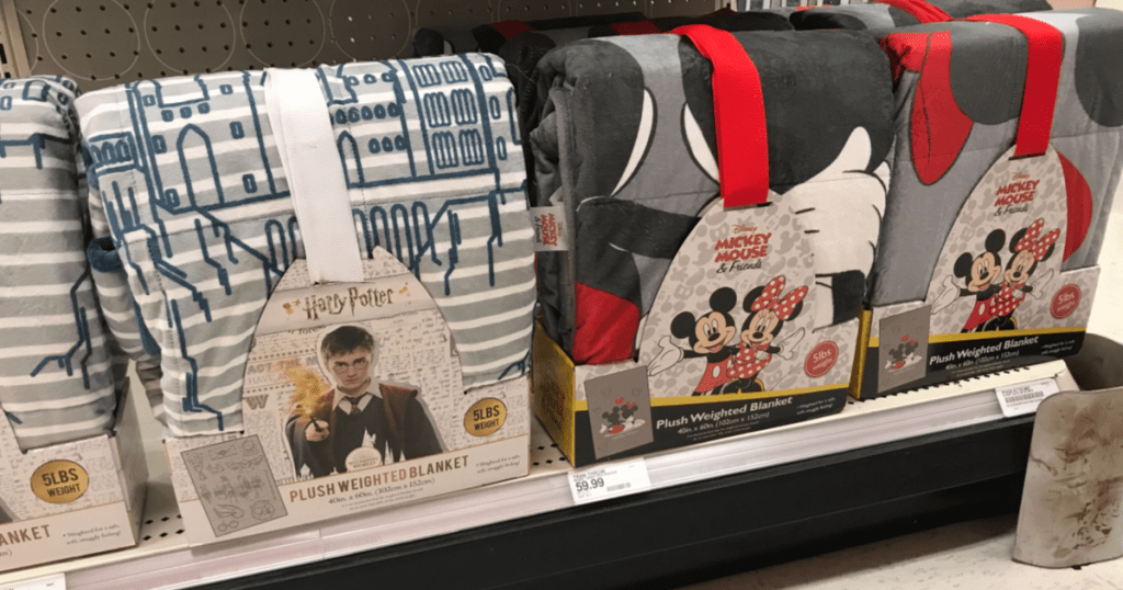 harry potter and mickey and friends weighted blankets on store shelf