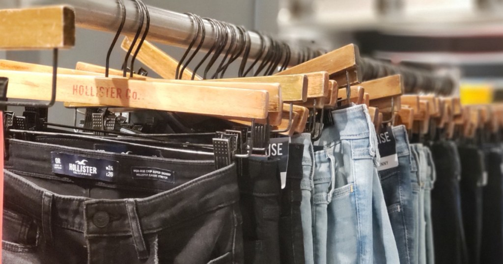 Hollister Jeans hanging on rack 