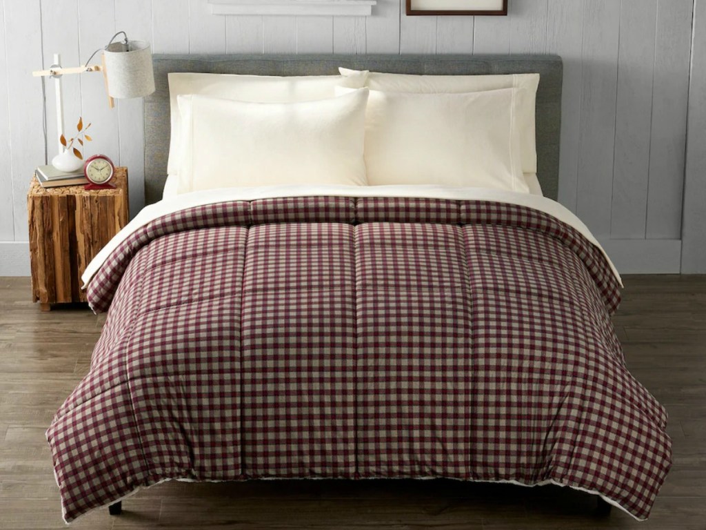 Bed made up with farmhouse plain comforter