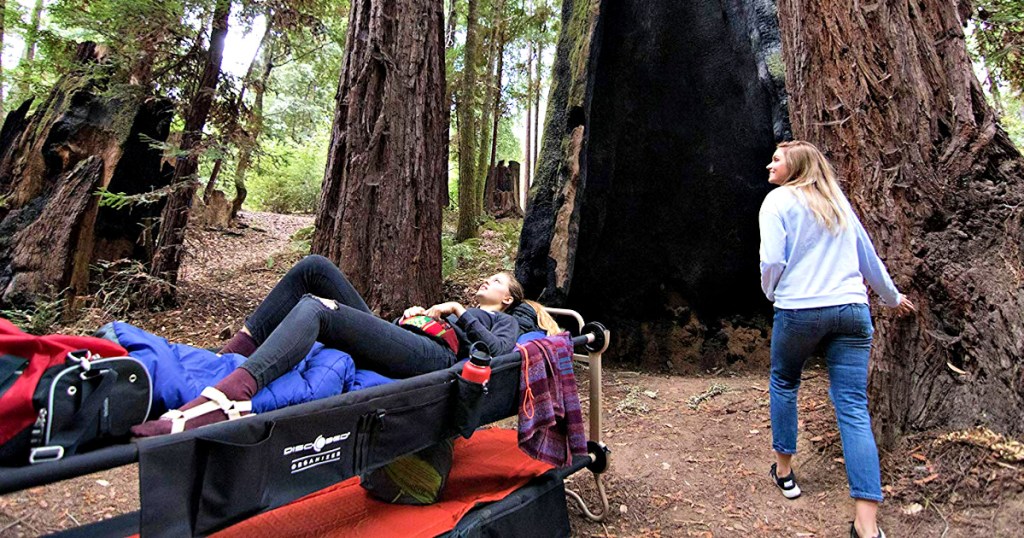 Disc-O-Bed in forrest with ladies camping