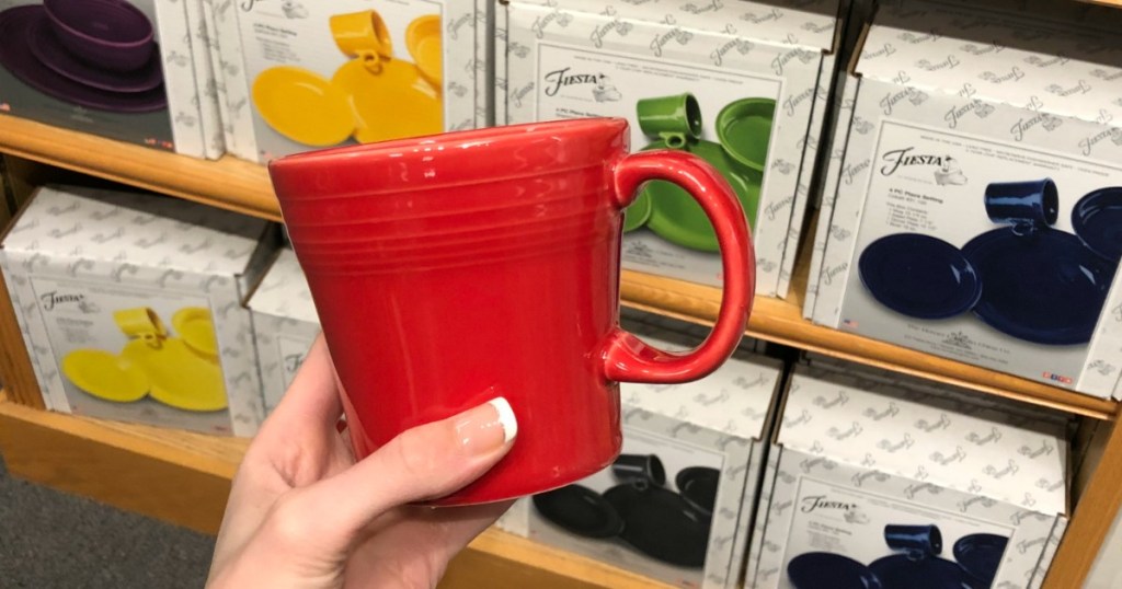 Woman holding red Fiesta Mug
