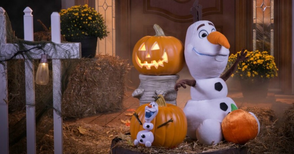 Holiday Living Mummy Pumpkin Stand next to Olaf inflatable and pumpkins