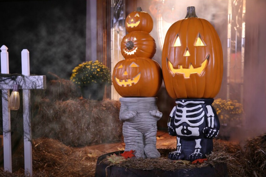 Holiday Living Mummy Pumpkin Stand in yard