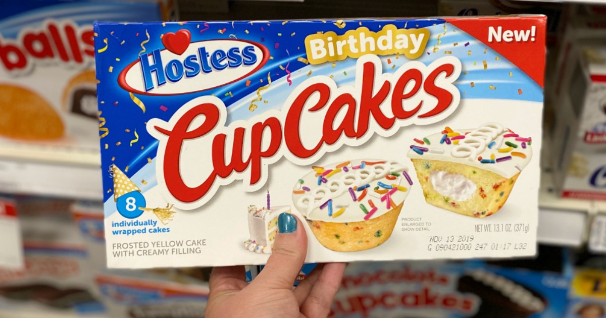hand holding up Hostess Birthday Cupcakes