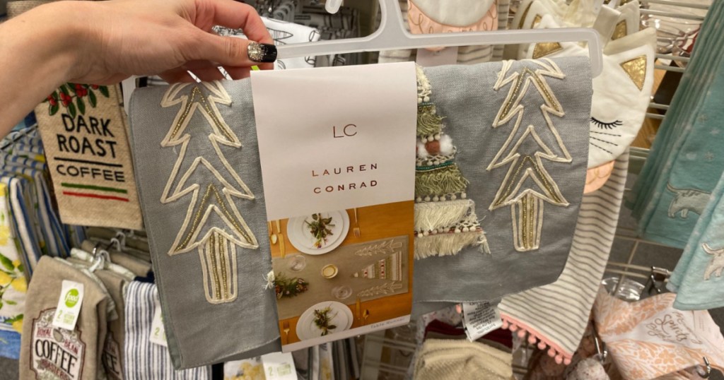 hand holding up lc lauren condrad holiday runner