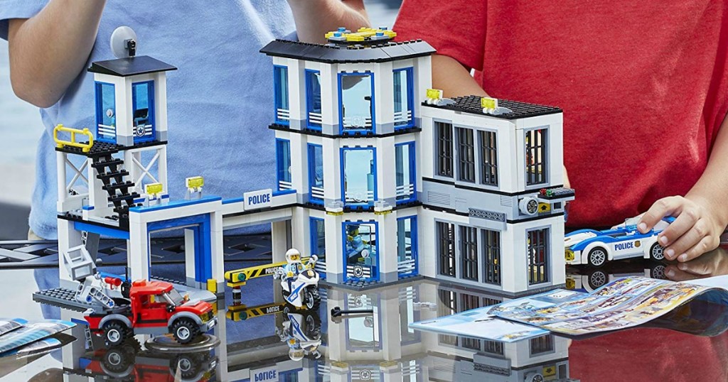 kids playing with LEGO Police Station set