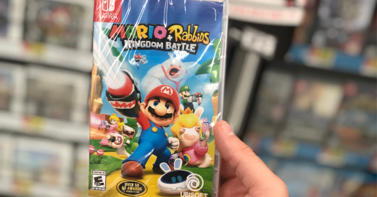 hand holding up mario rabbids game for nintendo switch