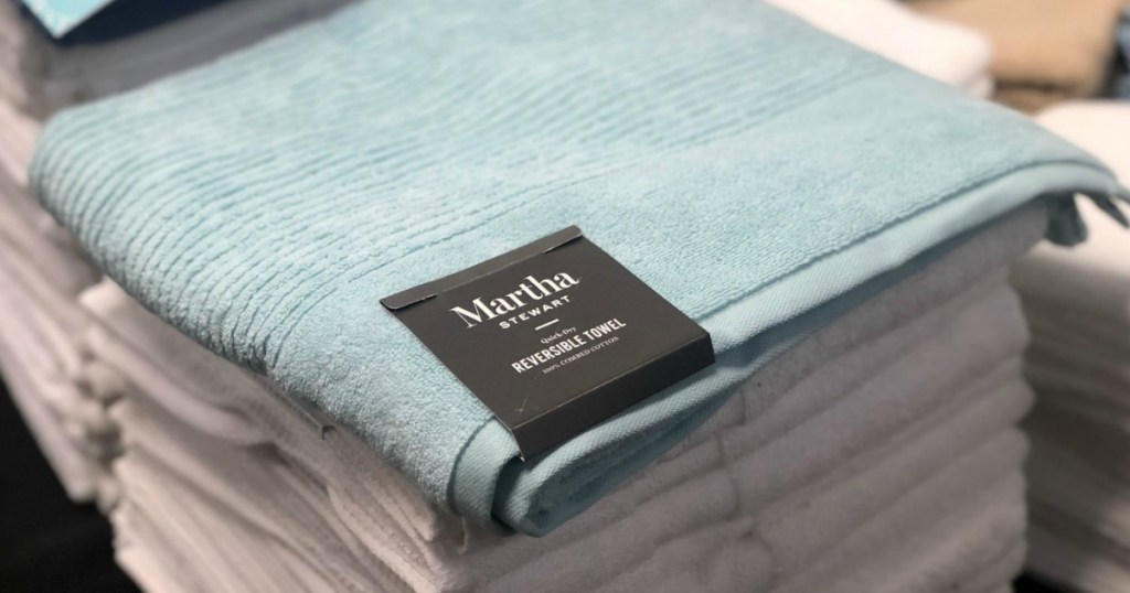 Martha Stewart Collection bath towels in stack on display at store