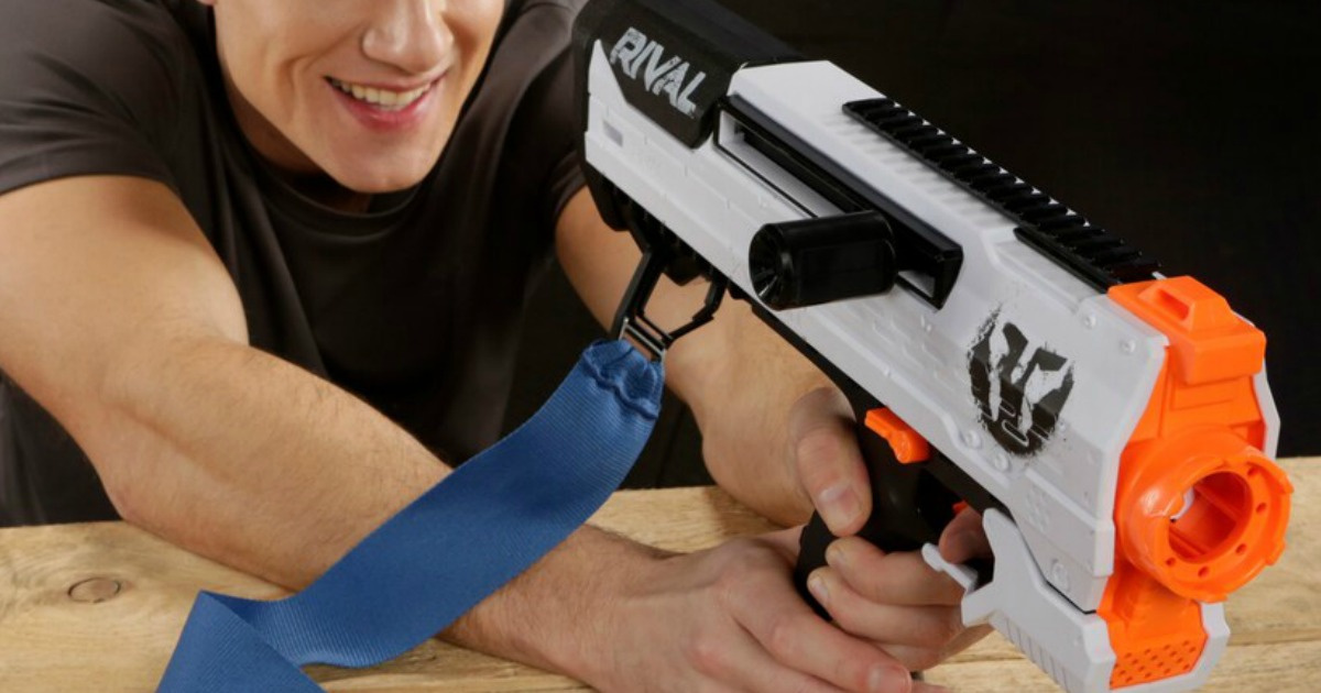 man aiming nerf blaster