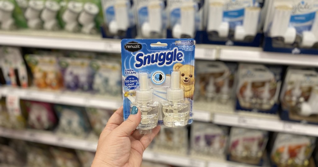 hand holding up snuggle product at target