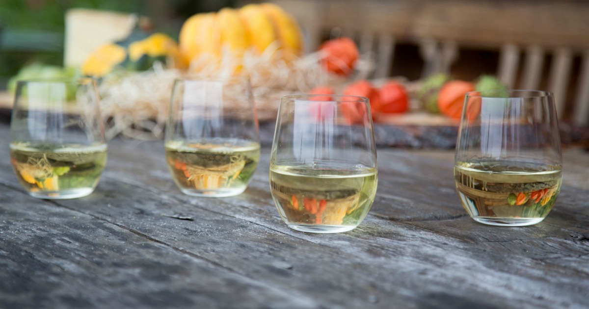 Riedel Wine Tumblers on table with white wine