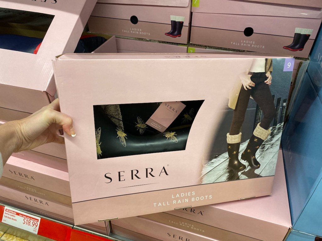 hand holding Serra Women's Rain Boots box