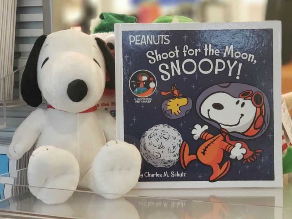 Snoopy plush on store display in Kohl's with Snoopy themed book