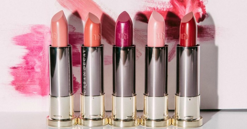 Urban Decay lipsticks againt lipstick covered background